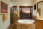 Jetted tub, large walk in shower, and yes.. more views